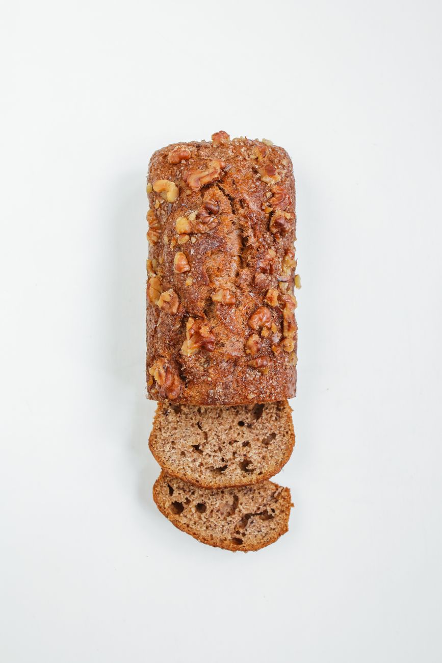 sliced brown bread on white surface